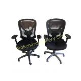 Pair of black office chairs