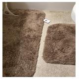 Group of bathroom rugs