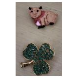 Clover and pig pins