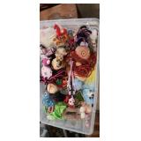 Tote of stuffed animals and ornaments