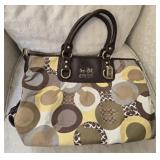 Yellow and tan coach bag