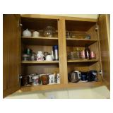 Contents of cabinet, mugs, glassware, pickle jar,