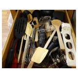 Contents of drawer, kitchen utensils, spatulas,