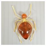 2" Baltic amber spider pin set in gold tone