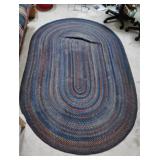 LARGE OVAL BRAIDED RUG