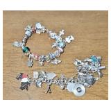 (2) CHARM BRACELETS W/ SOME STERLING CHARMS