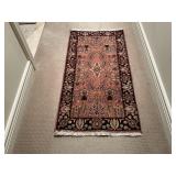 Hand knotted, throw rug