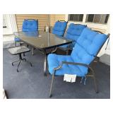 Seven piece outdoor patio set plus small table