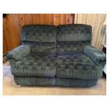 Upholstered reclining loveseat