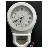 Battery operated white wall clock