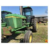 John Deere 4440, 9925 hours showing