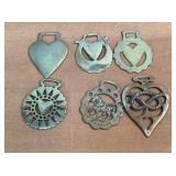 Lot of six brass wall hanging medallions