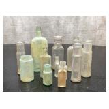 Lots of vintage medicine bottles