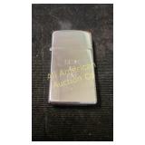 Zippo "Trust No One" engraved slimline lighter