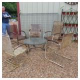Clear Coated Table and Five Chairs,