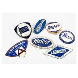 COLLECTION OF ASSORTED AUTOMOBILE BADGES