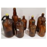 GROUP OF JAVEX & OTHER BROWN BOTTLES