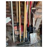 Assorted yard tools and spreader