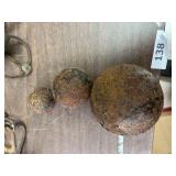 3 various size cannon balls