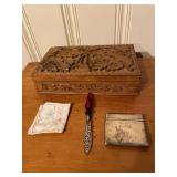 Carved wood vanity box, antique letter opener, antique cigarette holder with monogram, embroidered hankie