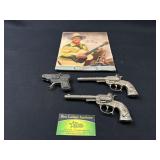 Gene Autry Note Pad and Toy Cap Guns