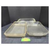 Two Pyrex glass baking dishes and an anchor oven