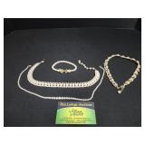 3 necklaces inc Trifari and 1 bracelet