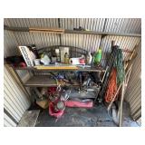 Contents of Side of Shed Shelf of Gardening Tools