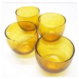 Four yellow round votive candle holders glass