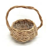 Round basket tall handle woven twigs