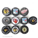 Autographed Hockey Pucks - Hull (10)