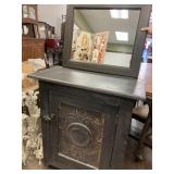 Primitive cabinet with mirror