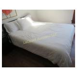 Queen bed mattress bedding pillows