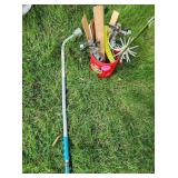 Variety of Lawn Sprinklers and Garden Tools