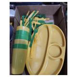 Green yellow plates cups utensils