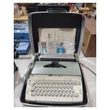 SCM Smith Corona portable electric typewriter in