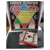 Chinese checkers board and vintage Monopoly game