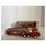 2 Metal toy fire trucks