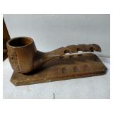 Wooden carved pipe stand