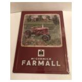 12 in x 17 in metal Farmall sign with tractor