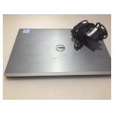 Dell Laptop with cord.