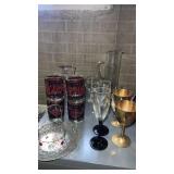 Lot of drinking glasses and decorative glass