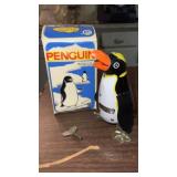 Rock and roll penguin wind up with key