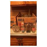 Lot of old glass bottles including rocking chair