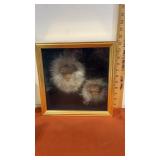 Shadow box with Eskimo masks with rabbit fur