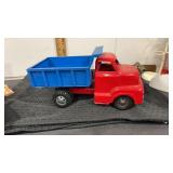 Dunwell   Toys pressed steel dump truck.  Has