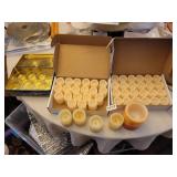 LOT OF FLAMELESS CANDLES AND HOLDERS