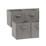 Four collapsible fabric storage cubes