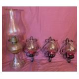 Vintage oil lamp and wall candles