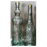 (2) Vintage Green Embossed Glass Bottles